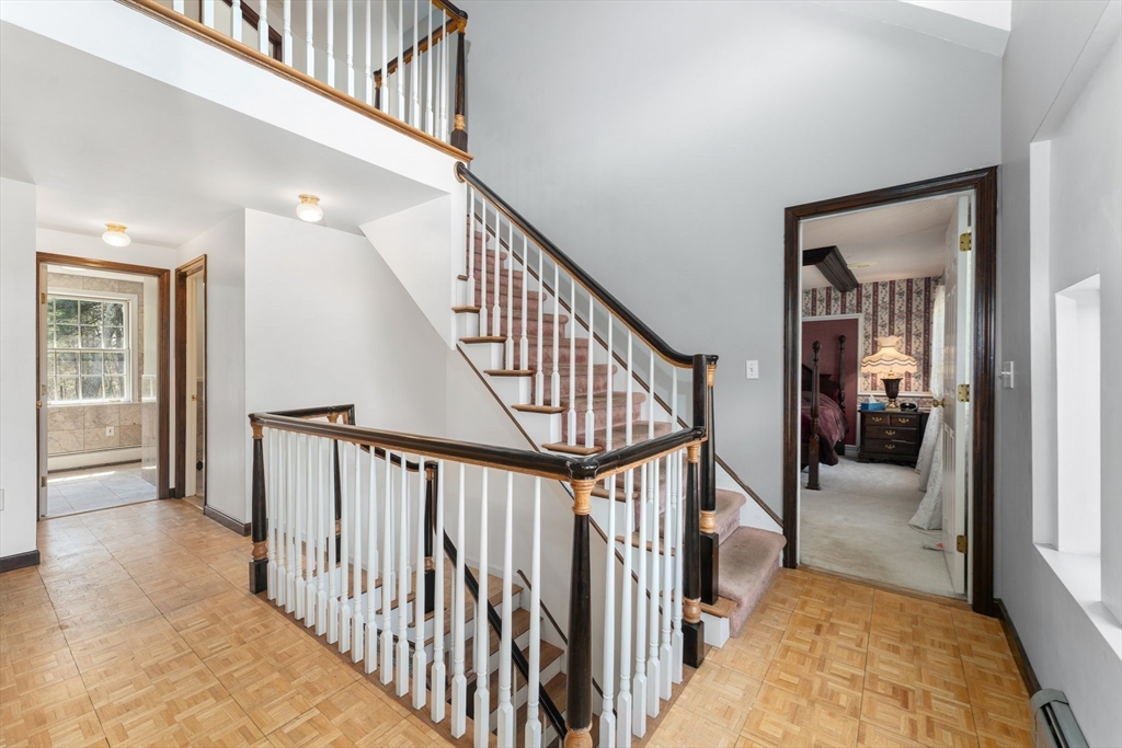 175 Pleasant Street Upton, MA 01568 - Photo 23 of 41 a view of a hallway view with staircase