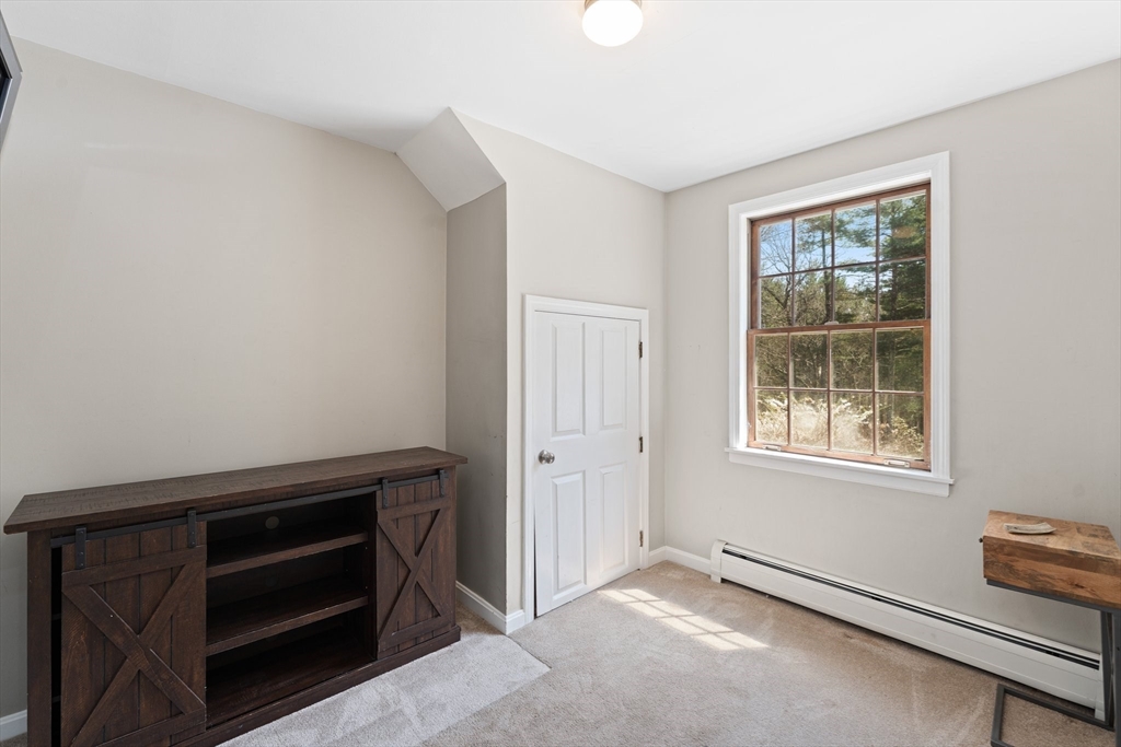 175 Pleasant Street Upton, MA 01568 - Photo 30 of 41 an empty room with windows