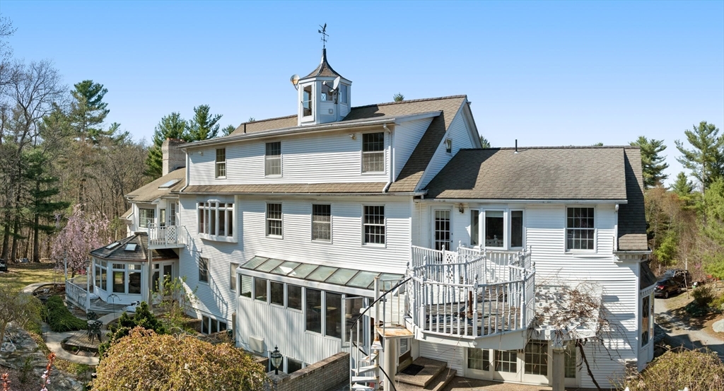 175 Pleasant Street Upton, MA 01568 - Photo 4 of 41 a front view of a house with a yard