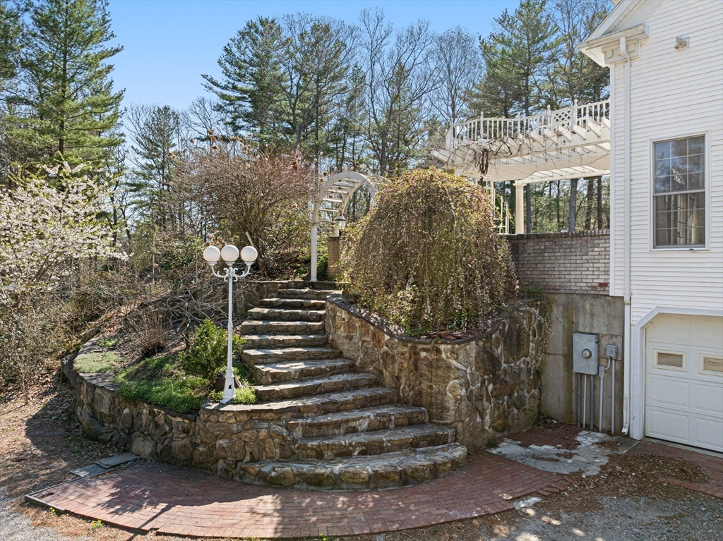 175 Pleasant Street Upton, MA 01568 - Photo 7 of 41 a view of a pathway of house