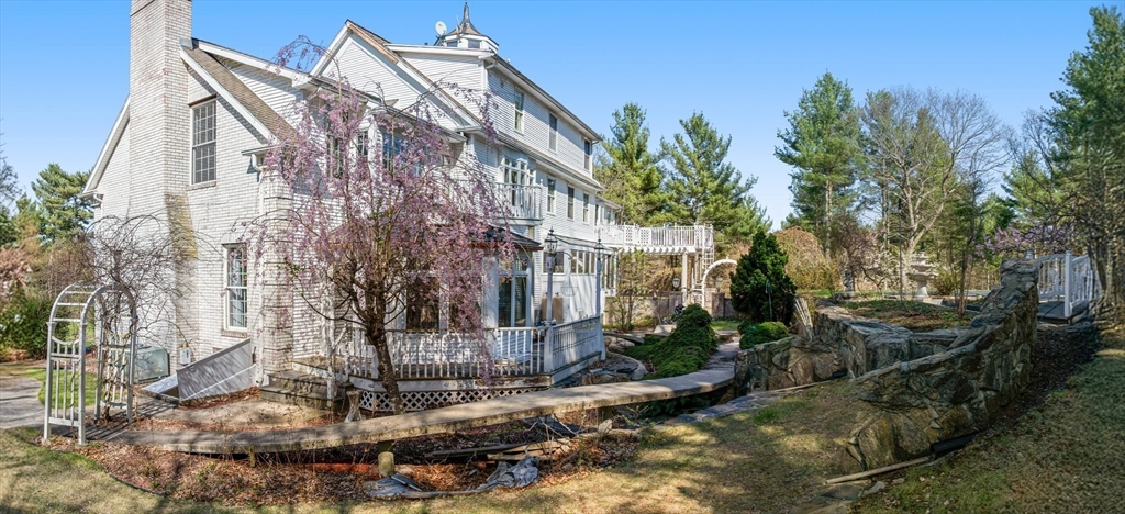 175 Pleasant Street Upton, MA 01568 - Photo 9 of 41 a view of a house with a yard