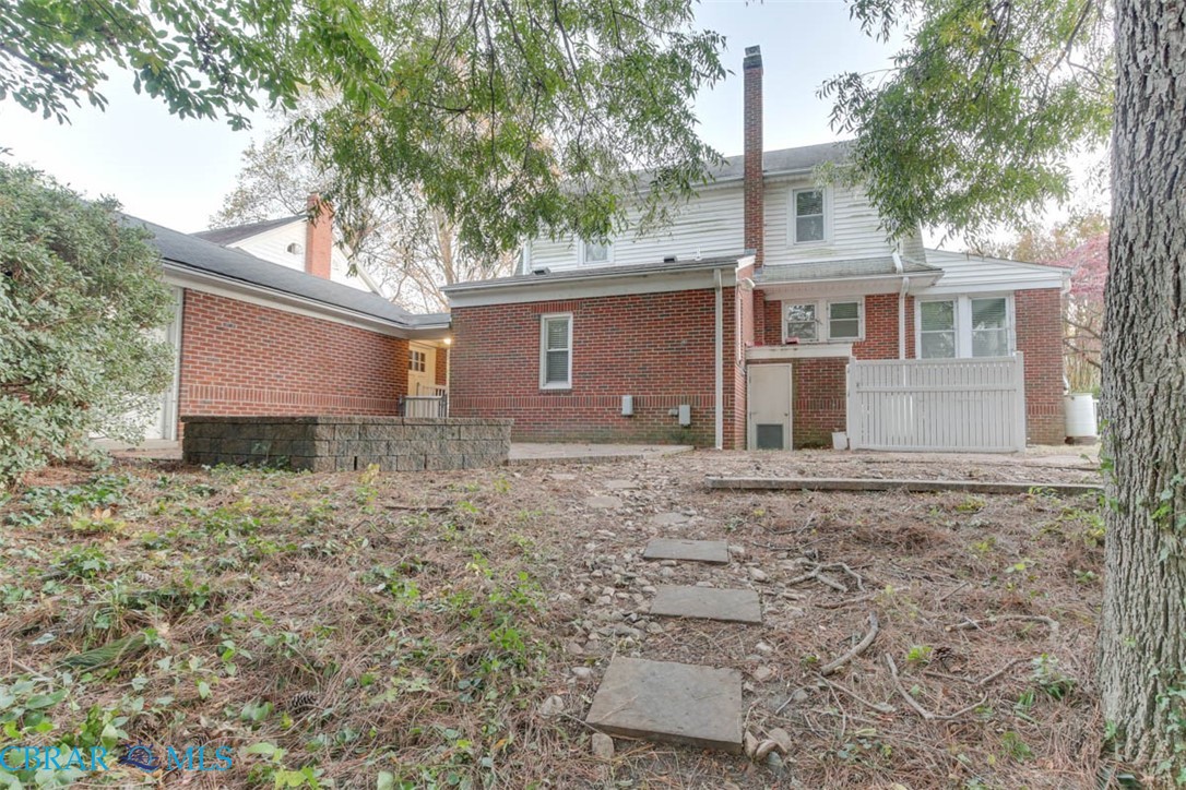144 Meredith Street Hampton, VA 23669 - Photo 35 of 36 front view of a house with a dry yard
