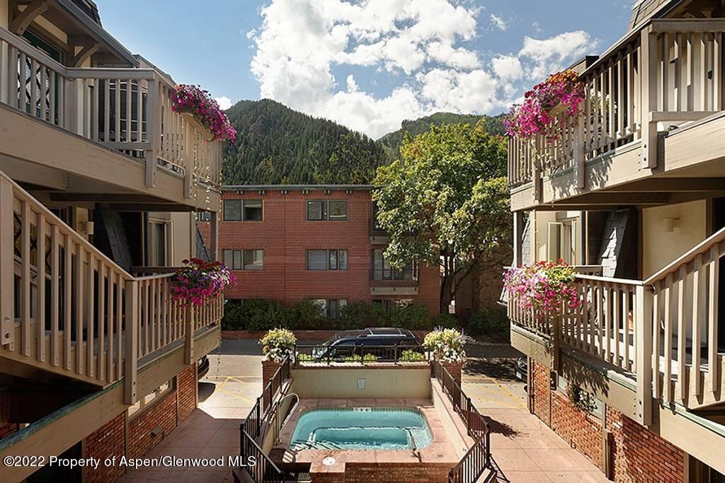 731 East Durant Avenue, Unit 6 Aspen, CO 81611 - Photo 14 of 14 a view of building with balcony