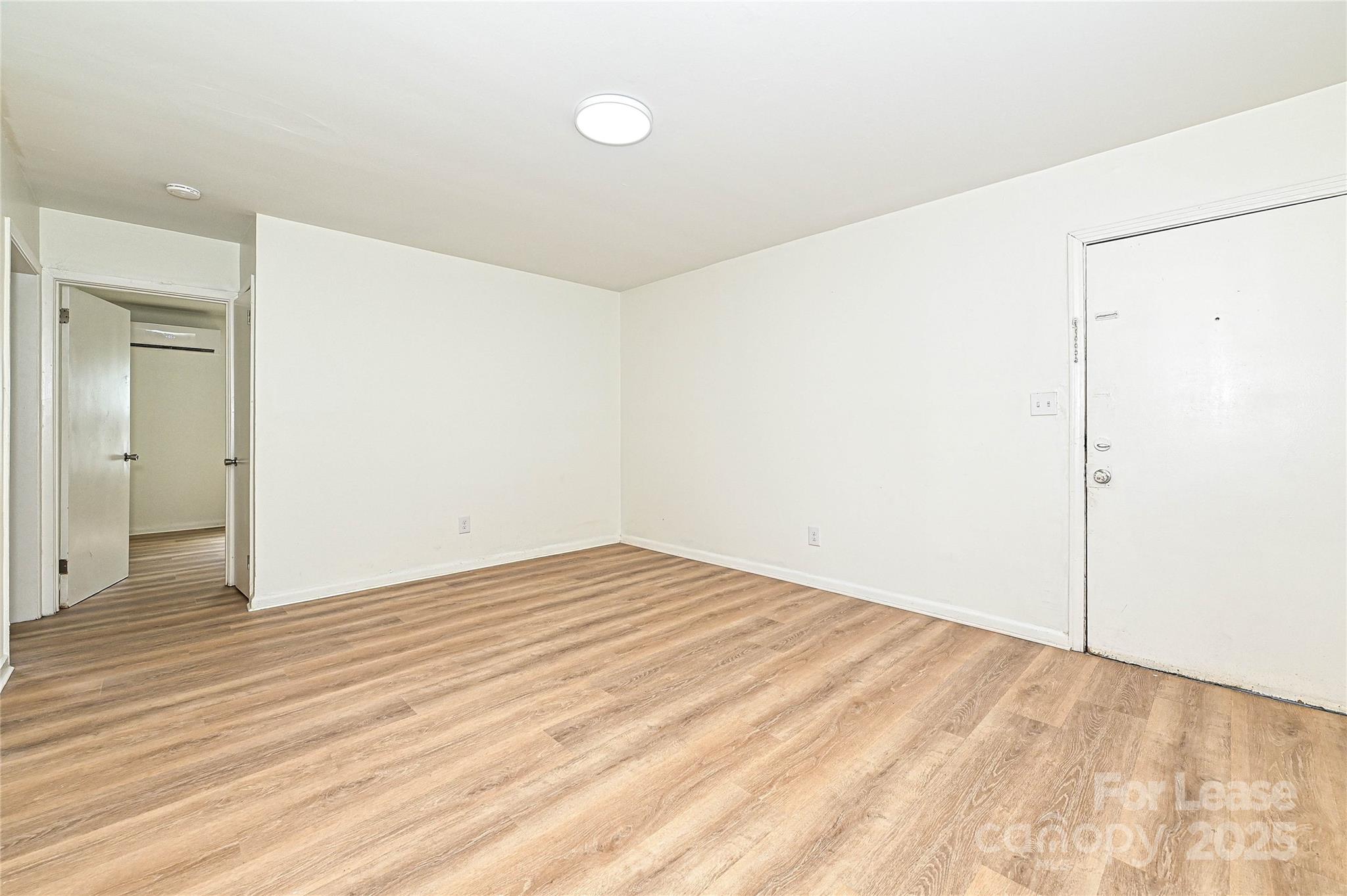 260 Church Street North, Unit 2 Concord, NC 28025 - Photo 5 of 12 a view of an empty room