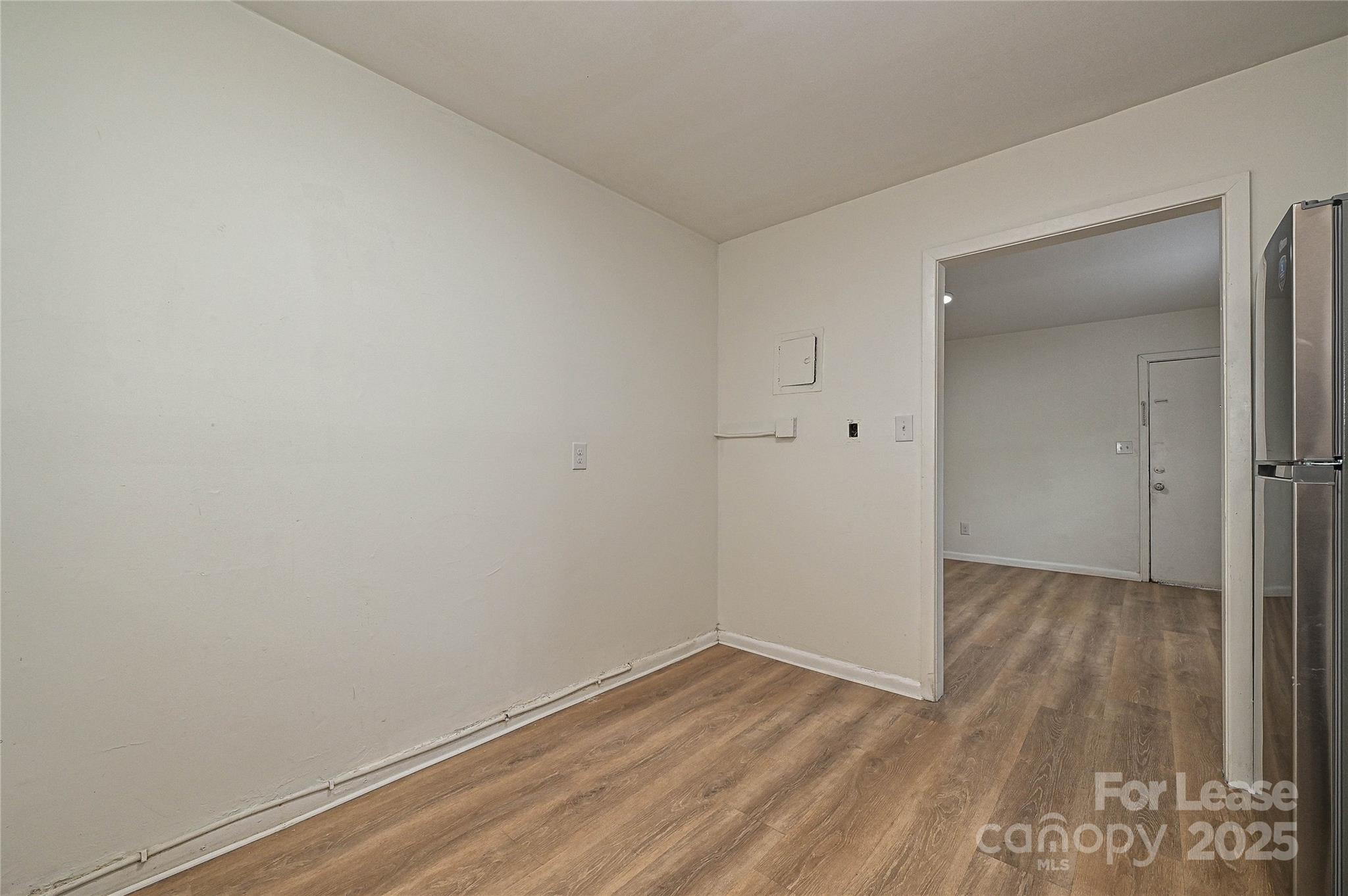 260 Church Street North, Unit 2 Concord, NC 28025 - Photo 8 of 12 a view of small space with wooden floor