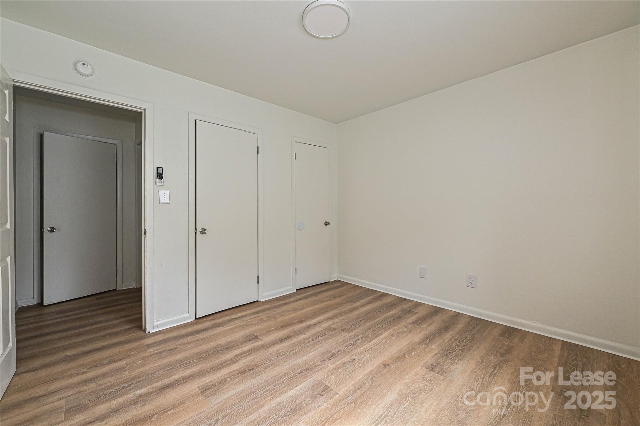 260 Church Street North, Unit 2 Concord, NC 28025 - Photo 10 of 12 a view of room with wooden floor