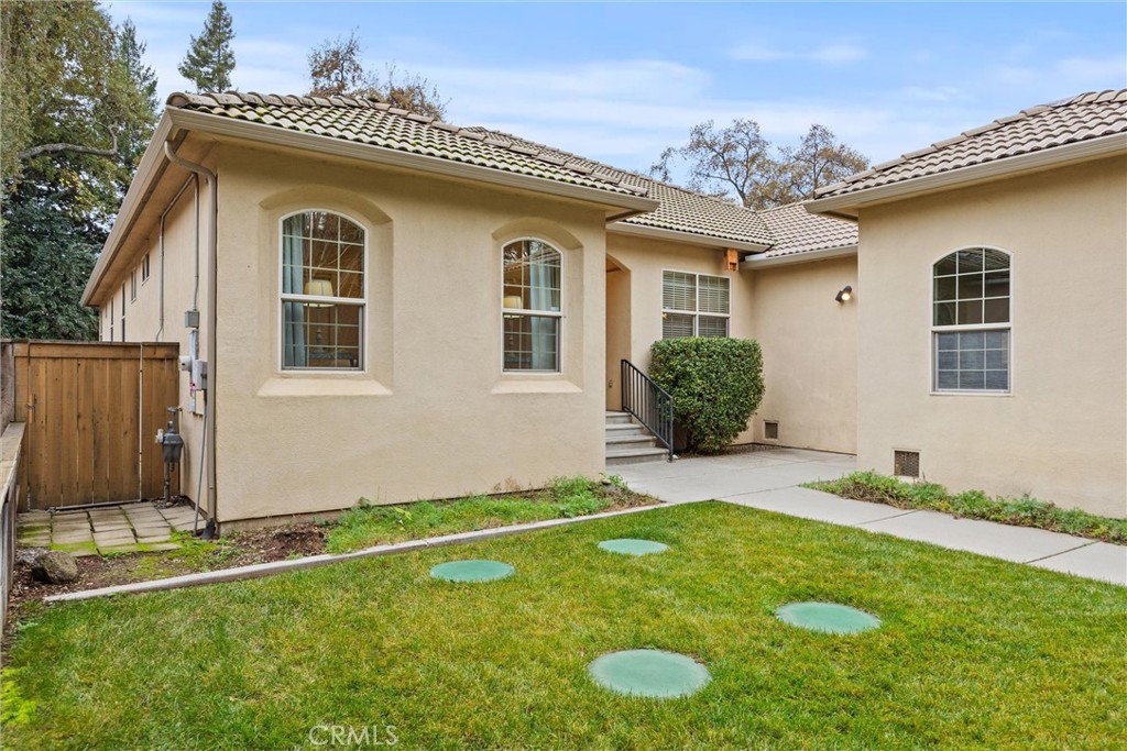 10473 Bogie Way Chico, CA 95928 - Photo 11 of 46 a front view of a house with a yard