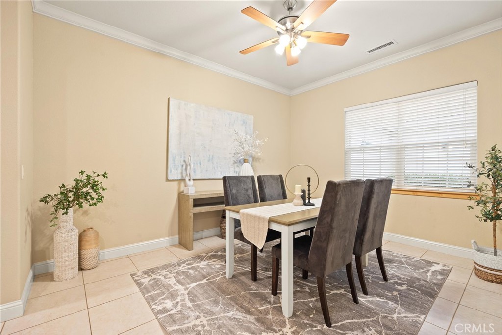 10473 Bogie Way Chico, CA 95928 - Photo 13 of 46 a view of a dining room with furniture and a chandelier