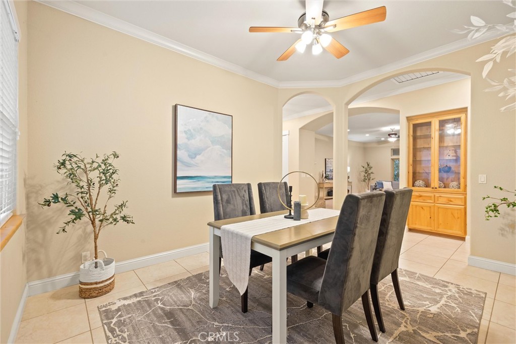 10473 Bogie Way Chico, CA 95928 - Photo 14 of 46 a view of a dining room with furniture and wooden floor