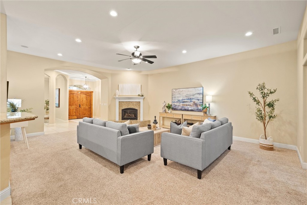 10473 Bogie Way Chico, CA 95928 - Photo 16 of 46 a living room with furniture and a fireplace