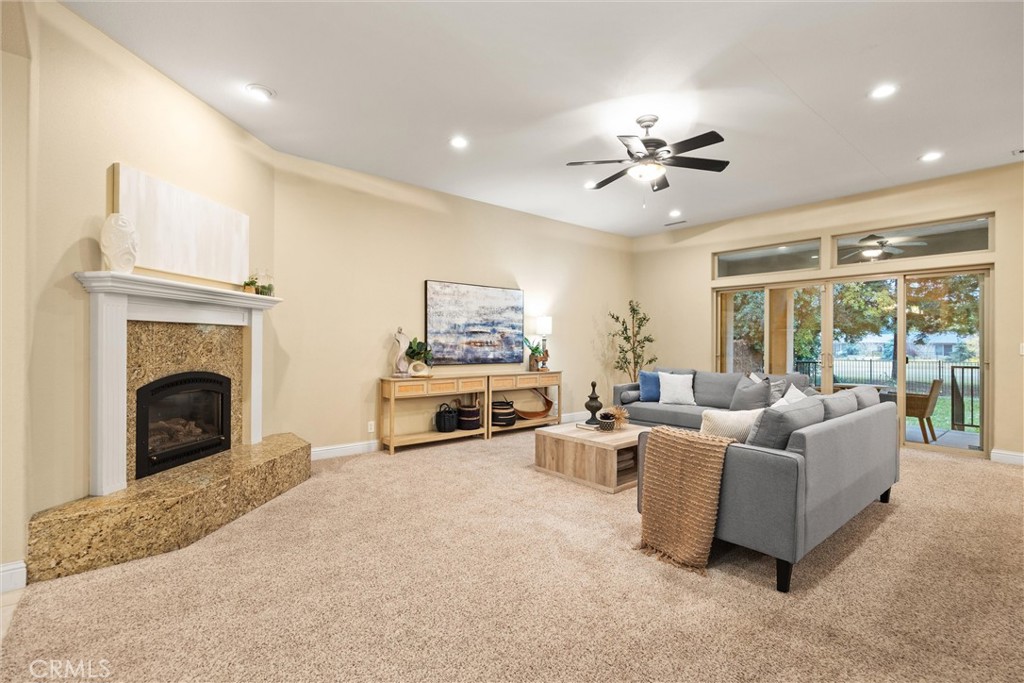 10473 Bogie Way Chico, CA 95928 - Photo 18 of 46 a living room with furniture and a fireplace