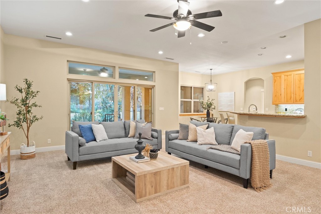 10473 Bogie Way Chico, CA 95928 - Photo 20 of 46 a living room with furniture and a large window