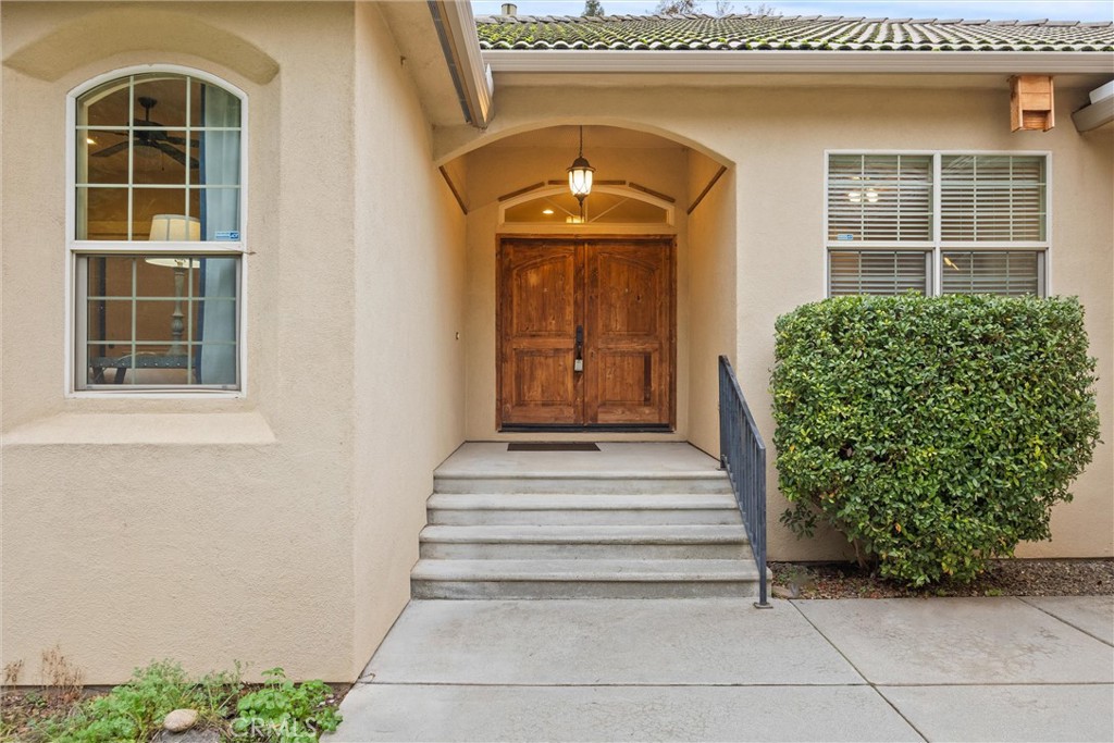 10473 Bogie Way Chico, CA 95928 - Photo 2 of 46 a front view of a house with entryway