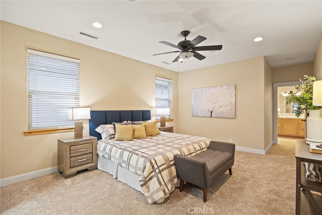 10473 Bogie Way Chico, CA 95928 - Photo 32 of 46 a living room with a bed furniture and a window