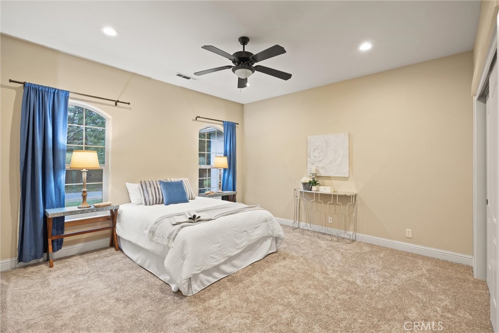 10473 Bogie Way Chico, CA 95928 - Photo 36 of 46 a bedroom with a bed and window