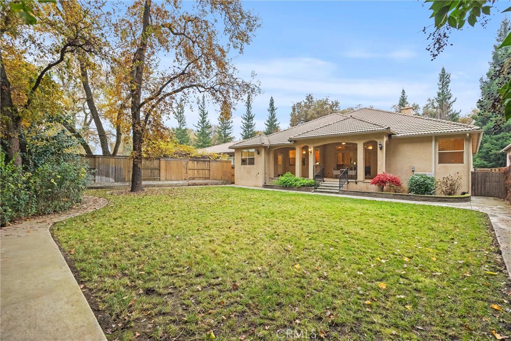 10473 Bogie Way Chico, CA 95928 - Photo 42 of 46 a front view of house with yard and green space
