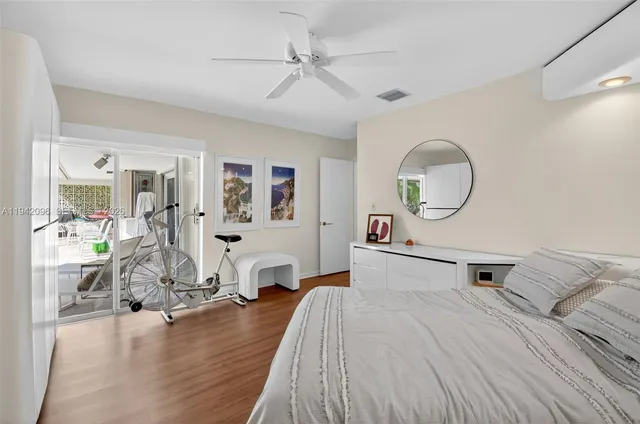 a bathroom with a sink double vanity and a mirror