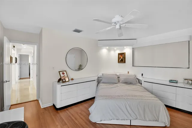 a bathroom with a sink vanity and a mirror