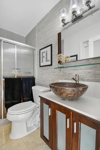 a view of swimming pool with seating space