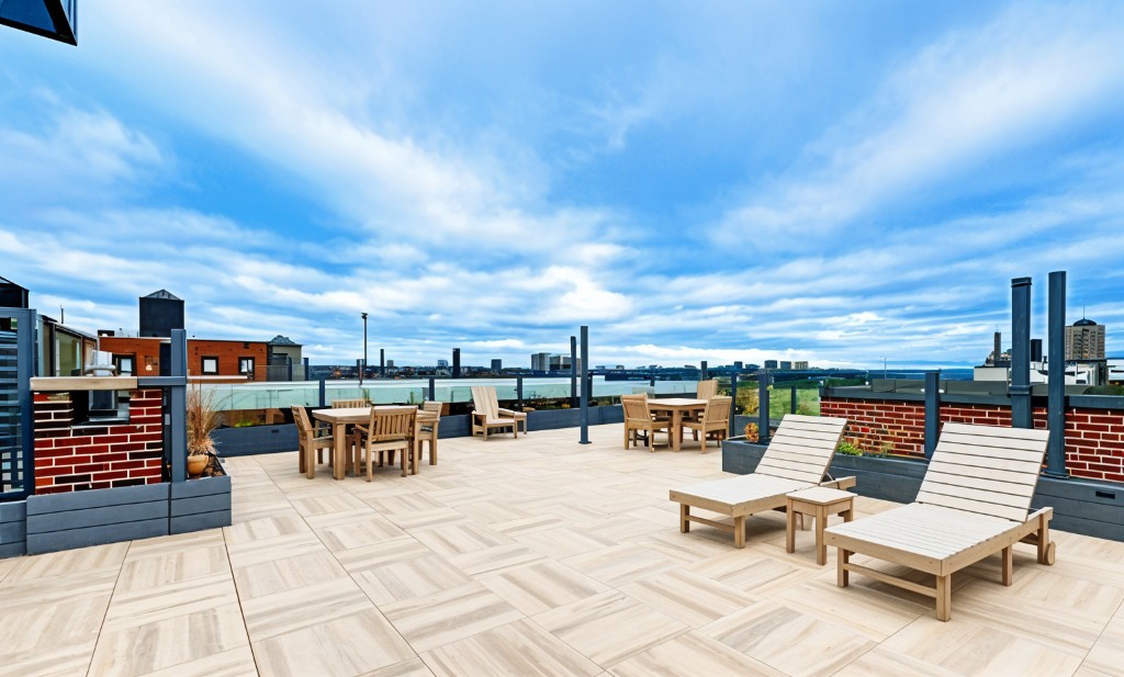425 Riverside Drive, Unit 6J Manhattan, NY 10025 - Photo 11 of 17 an outdoor sitting area with furniture and city view