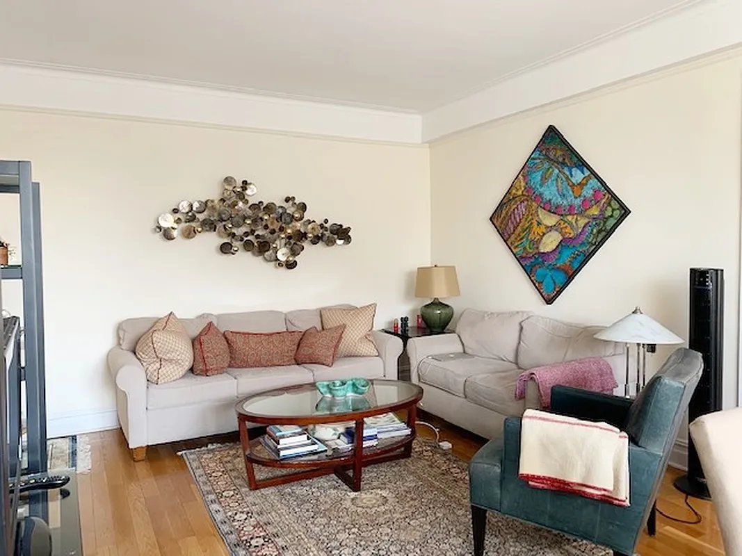 425 Riverside Drive, Unit 6J Manhattan, NY 10025 - Photo 2 of 17 a living room with furniture and a couch
