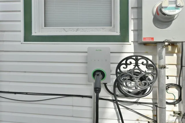 a bathroom with a stove and a window
