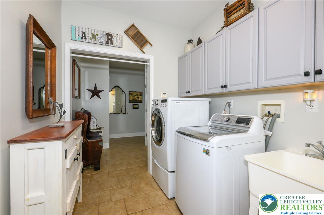 5331 Greenbriar Drive Bethlehem, PA 18017 - Photo 19 of 58 Ample cabinetry and a utility sink.