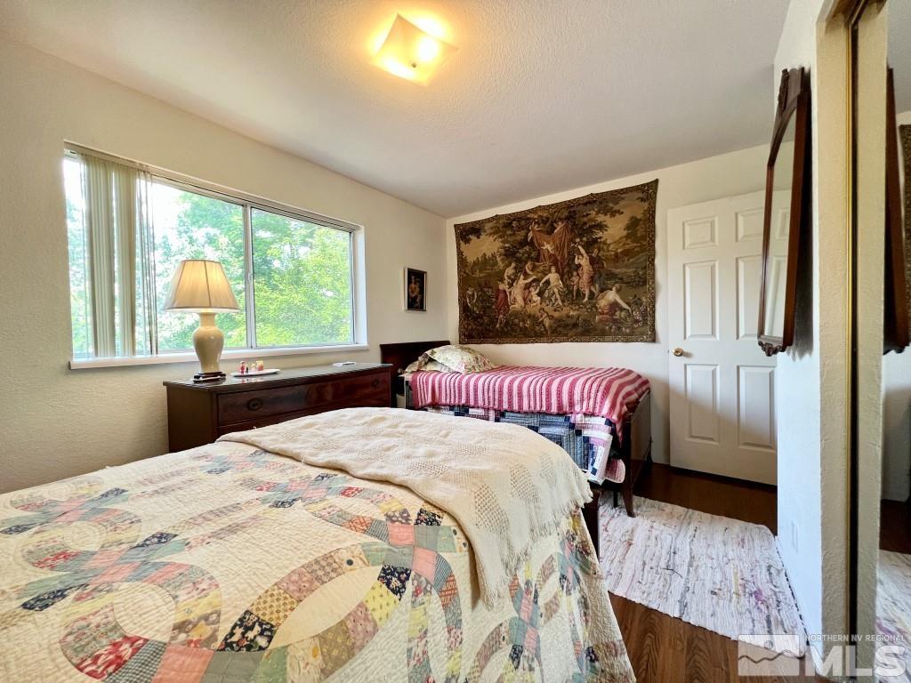 3365 Lookout Place Reno, NV 89503 - Photo 28 of 39 a bedroom with a bed and a window