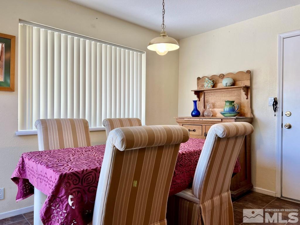 3365 Lookout Place Reno, NV 89503 - Photo 10 of 39 a bedroom with furniture and a chandelier