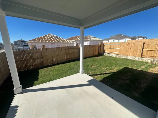 a view of a backyard with a garden