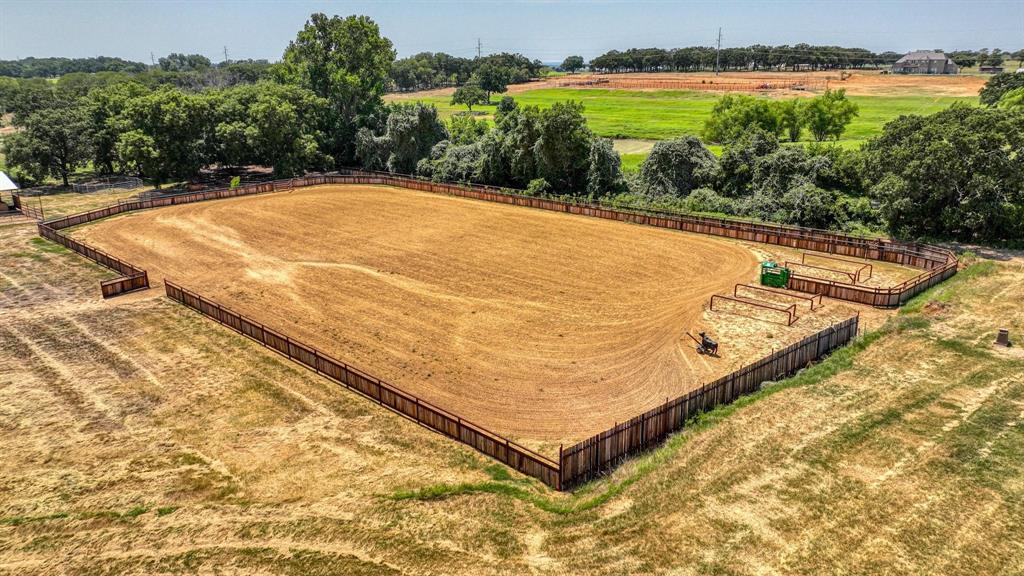 133 Prairie Lane Weatherford, TX 76087 - Photo 31 of 38 a view of a swimming pool with an outdoor seating and a yard