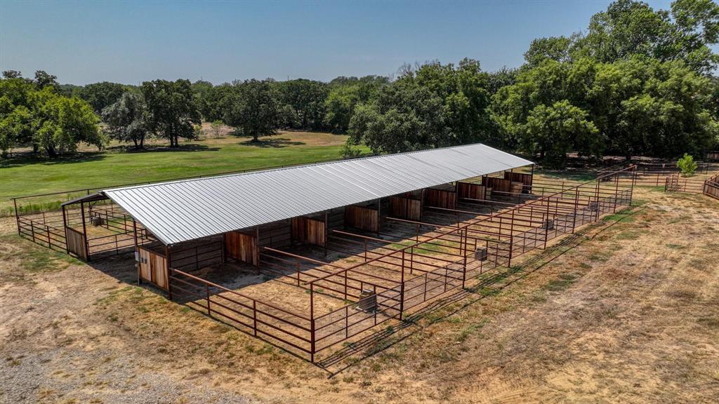 133 Prairie Lane Weatherford, TX 76087 - Photo 33 of 38 a view of a roof deck with yard and slide