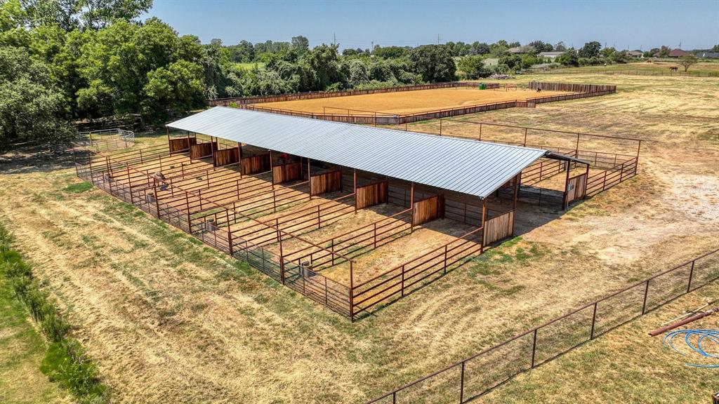 133 Prairie Lane Weatherford, TX 76087 - Photo 34 of 38 a view of a swimming pool with an ocean view
