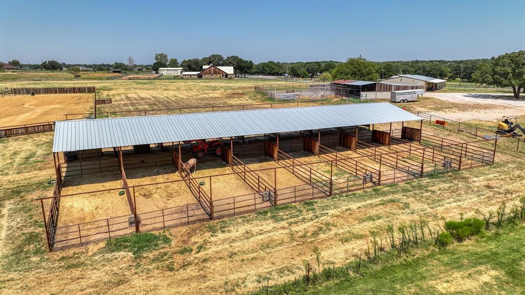 133 Prairie Lane Weatherford, TX 76087 - Photo 8 of 38 a view of a swimming pool with an ocean view