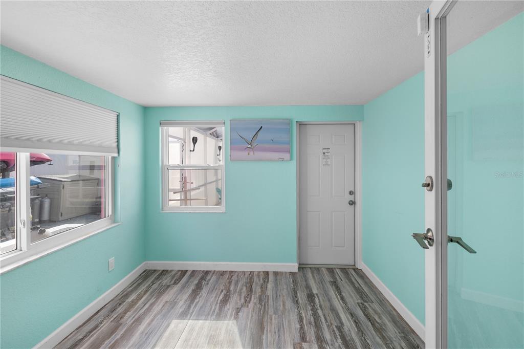 3336 Gulfview Drive Hernando Beach, FL 34607 - Photo 16 of 45 an empty room with closet and windows