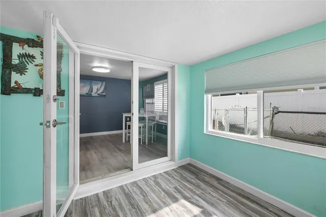 a bedroom with a bed and a table