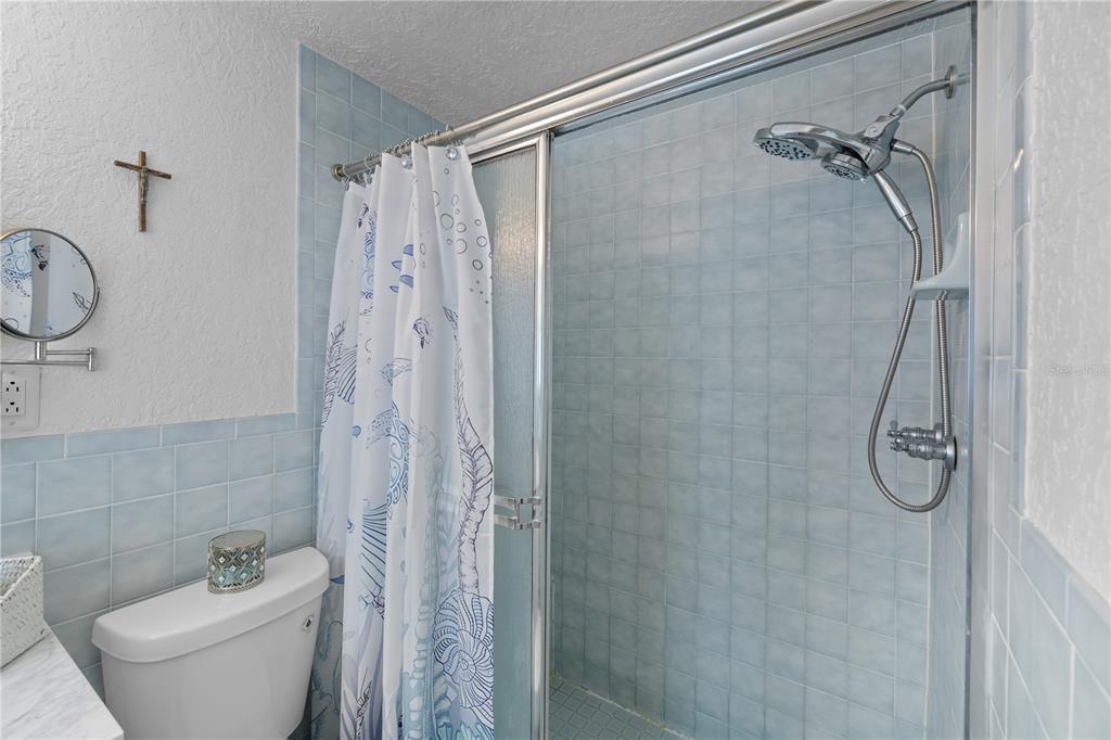 3336 Gulfview Drive Hernando Beach, FL 34607 - Photo 21 of 45 a bathroom with a shower toilet and sink