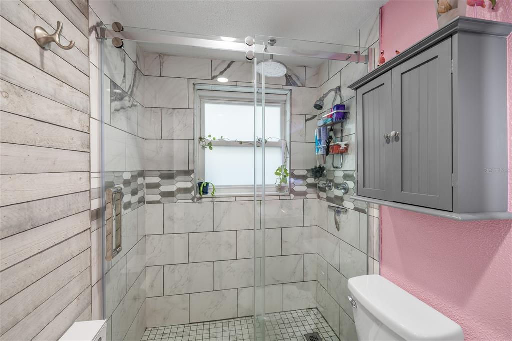 3336 Gulfview Drive Hernando Beach, FL 34607 - Photo 26 of 45 a bathroom with a sink toilet and shower