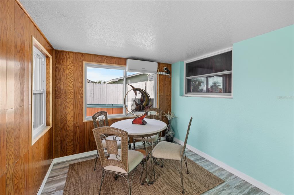 3336 Gulfview Drive Hernando Beach, FL 34607 - Photo 30 of 45 a dining room with furniture and window