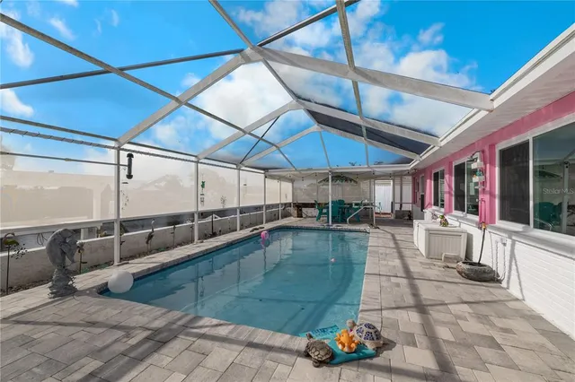 a view of a lake with sitting area