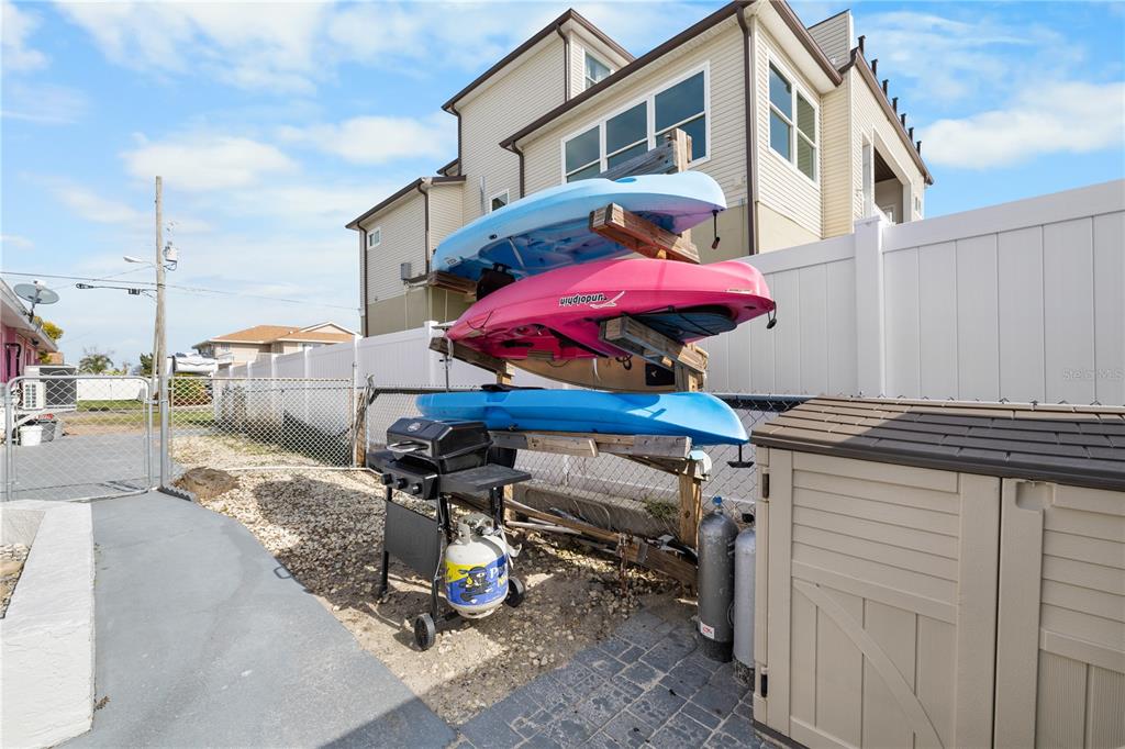 3336 Gulfview Drive Hernando Beach, FL 34607 - Photo 39 of 45 a view of a patio with a table and chairs