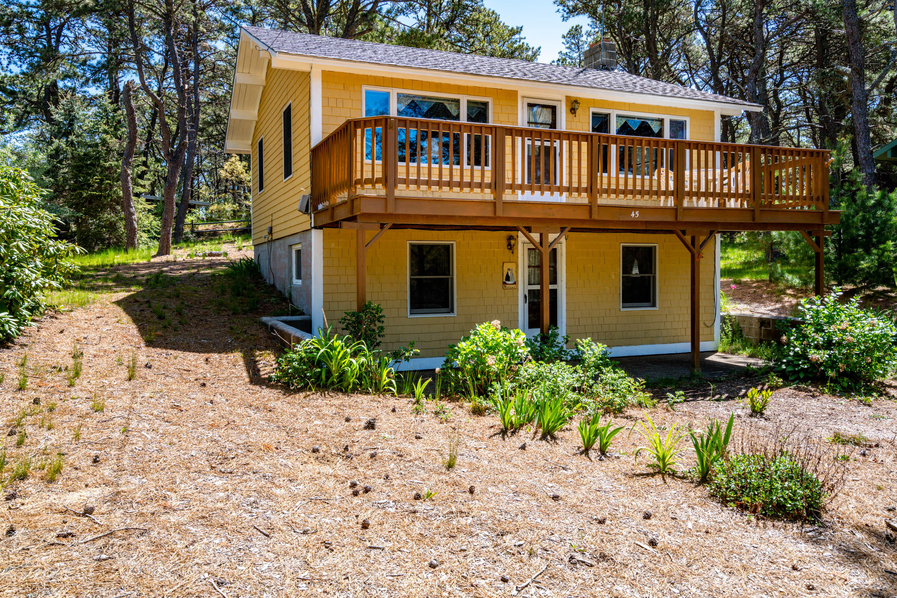 45 King Phillip Road Wellfleet, MA 02667 - Photo 1 of 22 a front view of house with yard