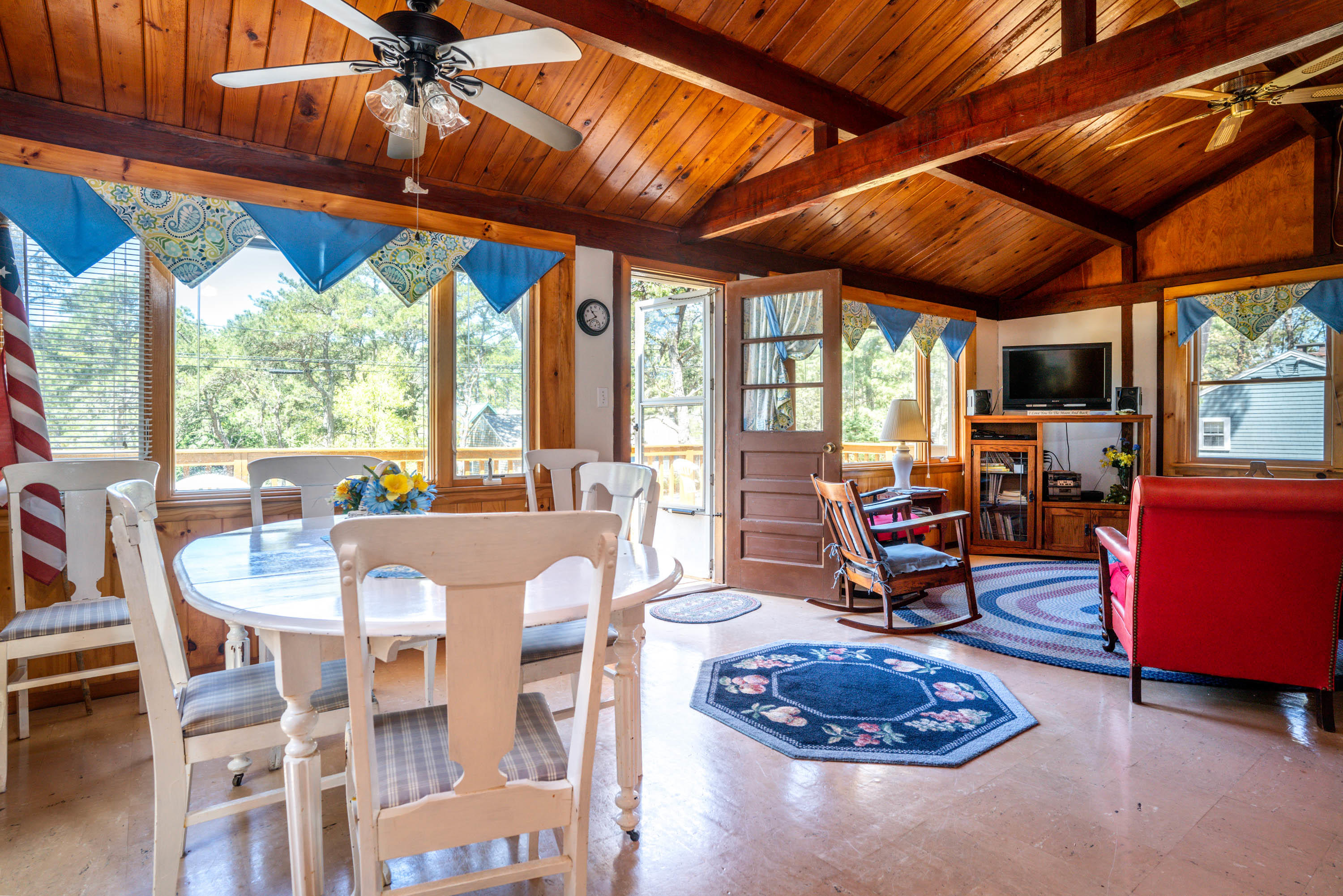 45 King Phillip Road Wellfleet, MA 02667 - Photo 11 of 22 a dining room with furniture fire place and a chandelier