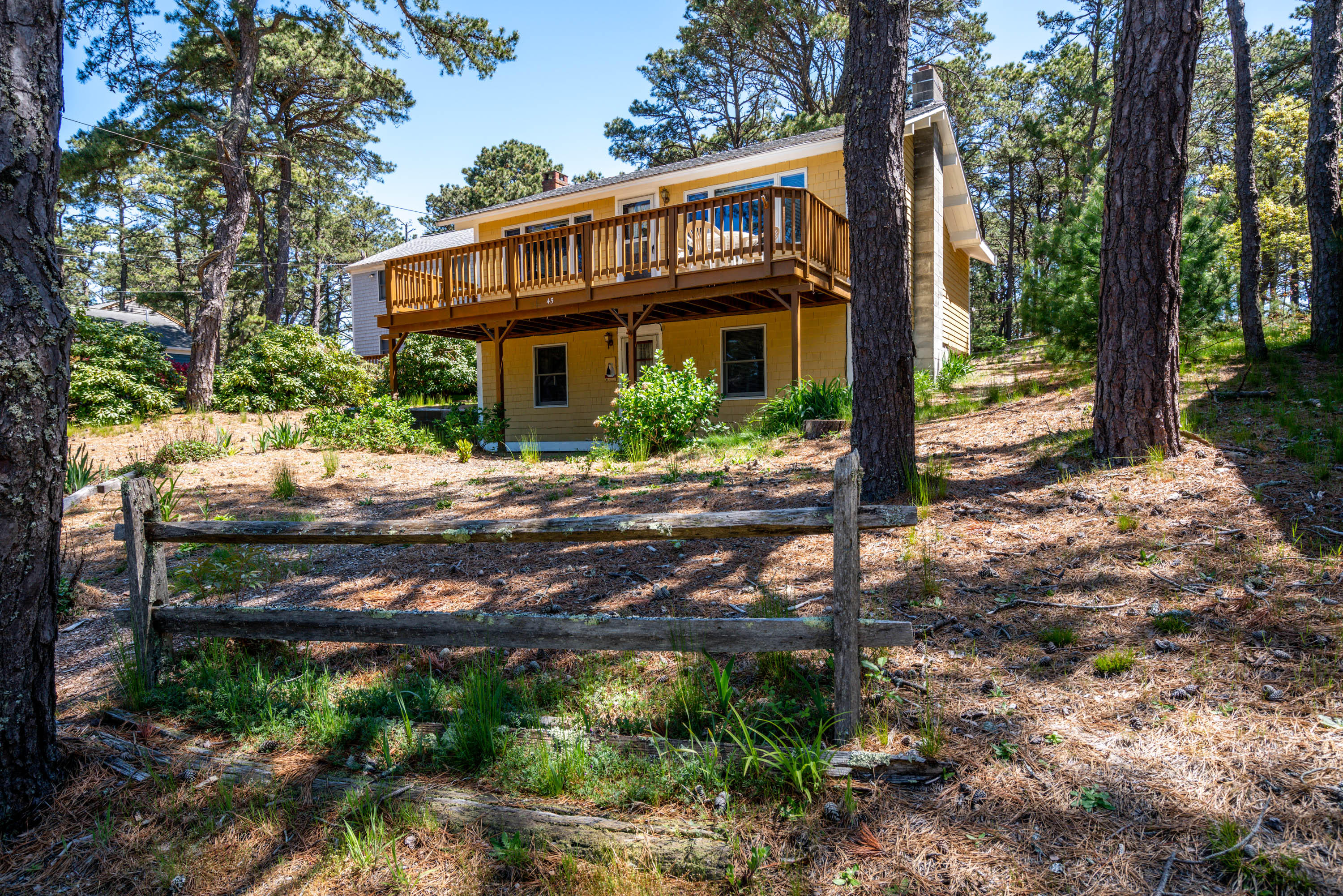 45 King Phillip Road Wellfleet, MA 02667 - Photo 3 of 22 a view of a house with a yard