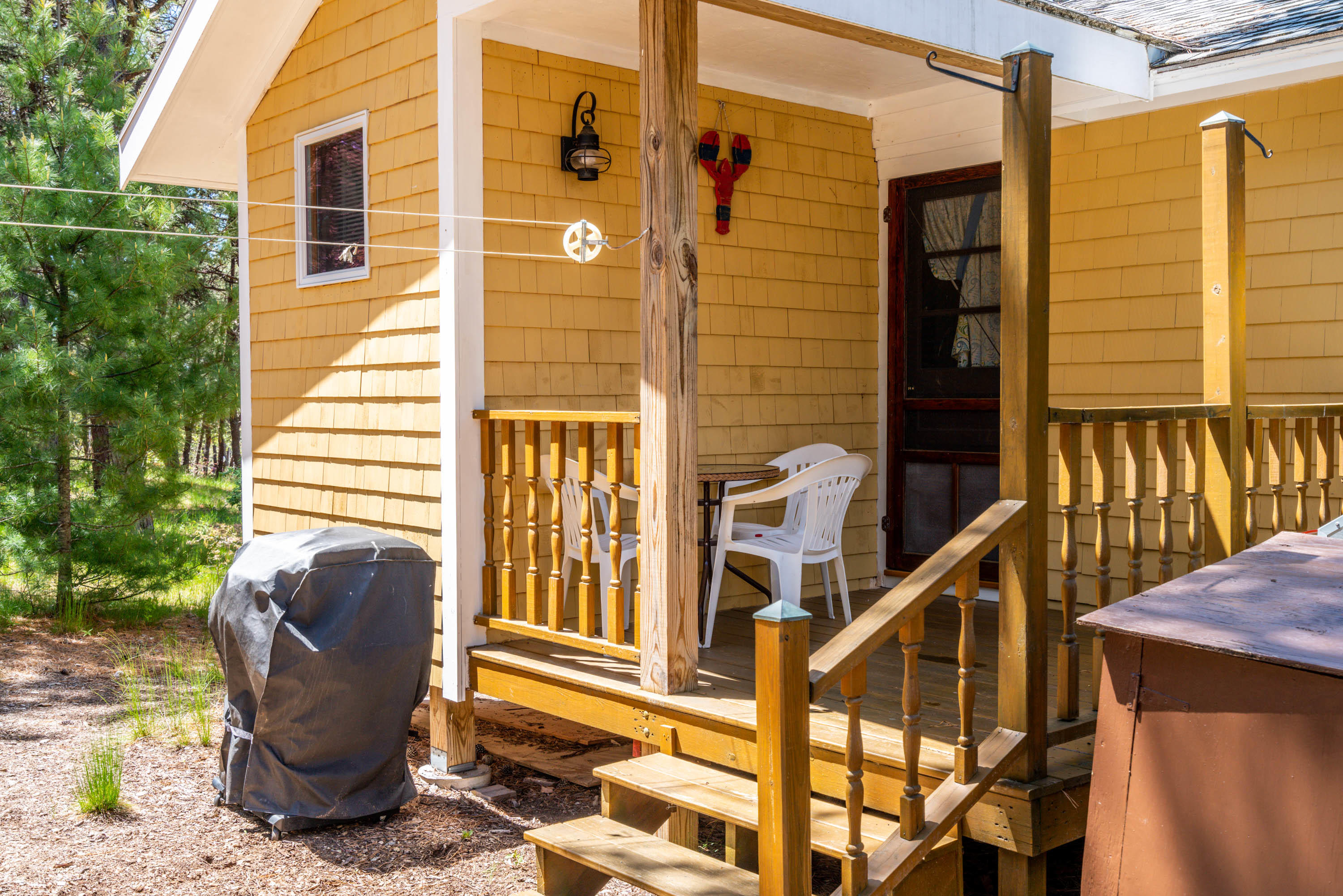 45 King Phillip Road Wellfleet, MA 02667 - Photo 5 of 22 a view of balcony with furniture