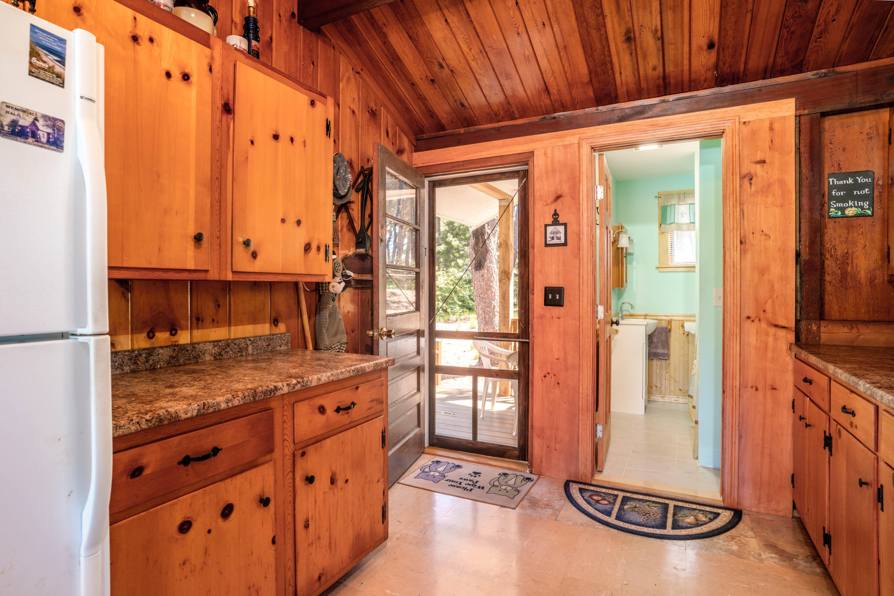 45 King Phillip Road Wellfleet, MA 02667 - Photo 9 of 22 a kitchen with stainless steel appliances granite countertop a refrigerator and a stove