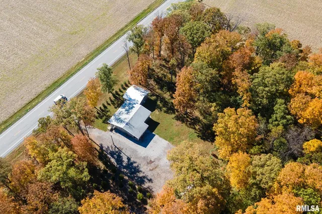 a view of outside house with a yard