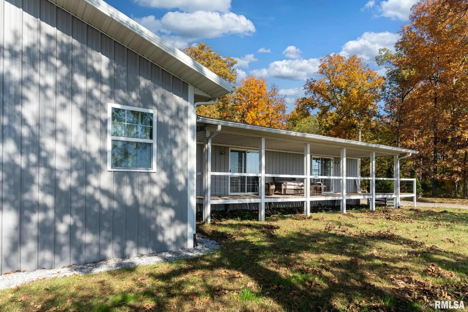 23115 Highway 14 Macedonia, IL 62860 - Photo 4 of 34 a view of a backyard