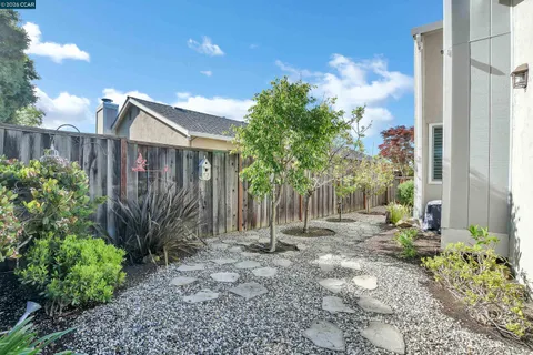 a backyard of a house with lots of green space