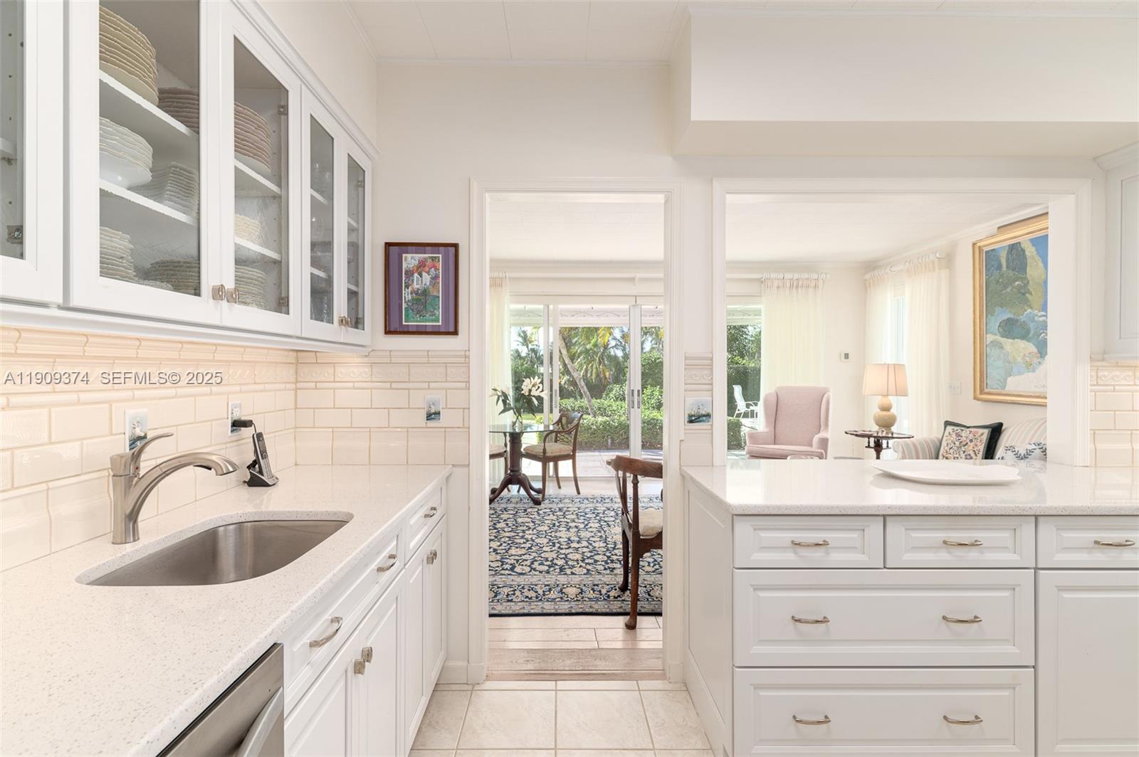 18 Gomez Road Jupiter Island, FL 33455 - Photo 13 of 34 a bathroom with a sink double vanity and windows